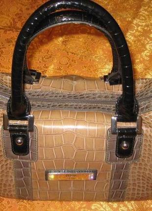 Продаж шкіряної  сумки  виробник фірма guess ect 1981