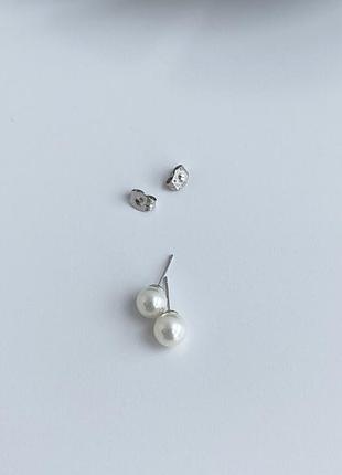 Сережки з штучного жемчуга