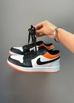 Жіночі кросівки nike air jordan retro 1 low black white orange2 фото