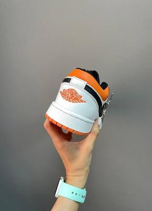 Жіночі кросівки nike air jordan retro 1 low black white orange6 фото