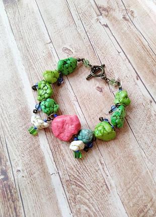 Браслет з тонованого говлита, бронзова фурнітура