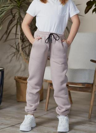 Подростковые бежевые штаны для девочки на байке зауженного кроя 134-152