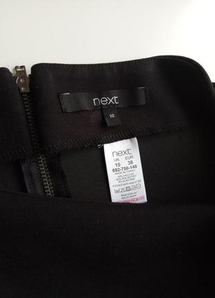 Черная юбка мини из плотной стрейчевой ткани на кокетке4 фото