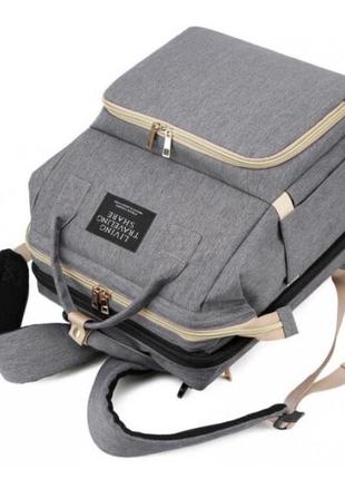 Универсальный рюкзак-кроватка для мам по уходу за детьми living traveling share. цвет: черный10 фото