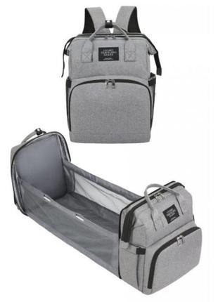 Универсальный рюкзак-кроватка для мам по уходу за детьми living traveling share. цвет: черный7 фото