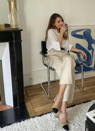 Подовжена півпрозора сорочка блузка