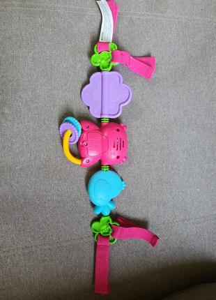Музична іграшка-розтяжка на автокрісло bright starts2 фото