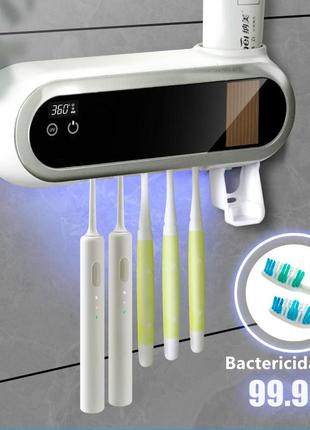Диспенсер - дозатор для зубной пасты и щеток ультрафиолетовый стерилизатор(уф стерилизатор)1 фото