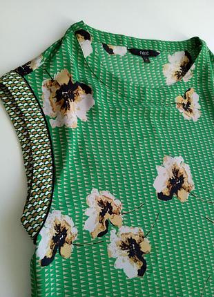 Блуза в квітковий принт з комбінованими вставками