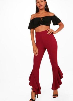 Чорні кльош з люрексом / легінси з бахромою.