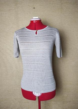 Бежевий трикотажний топ футболка в рубчик