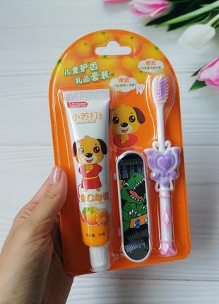 Набір : зубна паста + щітка + іграшка1 фото