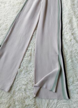 Довгі трикотажні штани палаццо з лампасами длинные вязаные штаны палаццо с лампасами2 фото