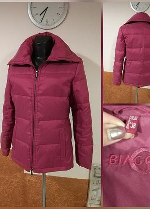 Фірмова стильна якісна тепла легка натуральна пухова куртка.