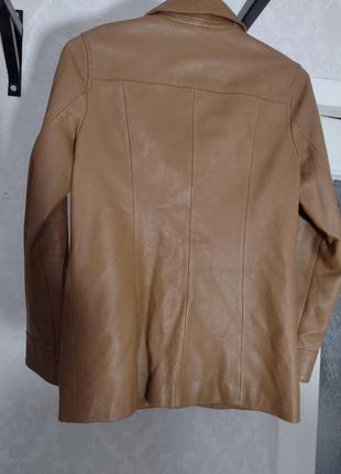 Шкіряна куртка розмір с2 фото