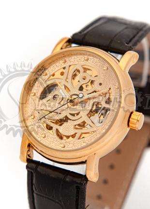 Часы мужские механические skeleton forsining gold crystal auto1 фото