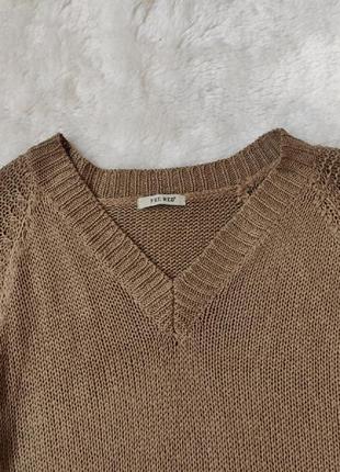 Бежевый коричневый длинный свитер вязаная кофта с завязками по бокам люверсами вырезом удлиненный7 фото