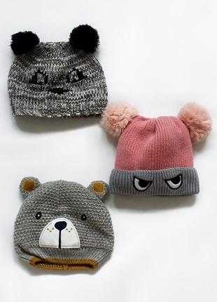Шапочки з помпонами