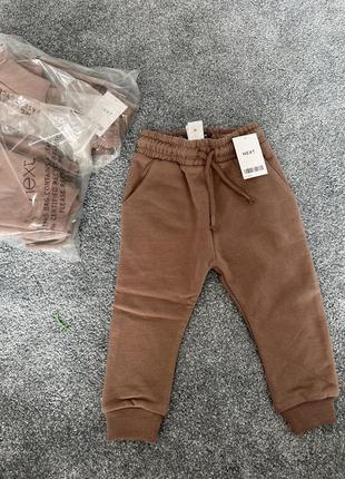 Новые теплые штаны коричневые