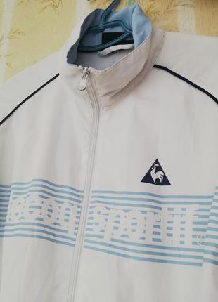 Куртка ветровка чоловіча спортивна біла з синім le coq sportif на молнії1 фото