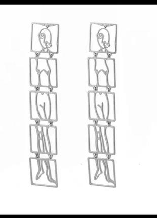 Оригінальні сережки людина в сегментах2 фото