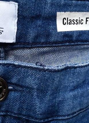 Женские стрейчевые джинсы с вышивкой на карманах.3 фото