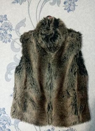 Тепла жилетка