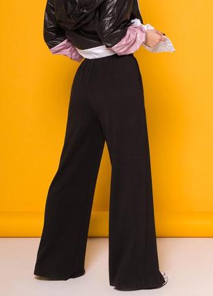 Чорні штани палаццо з розрізами3 фото