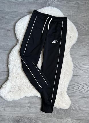Nike спортивні штани на дівчинку р. м