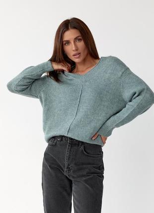 В'язаний жіночий пуловер з v-подібним вирізом8 фото
