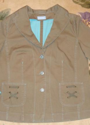 Очень красивый хлопковый пиджак цвета хаки с бирюзовой отделкой1 фото