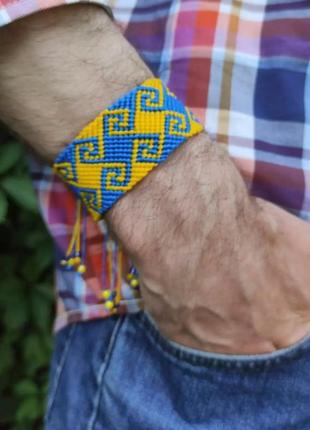 Чоловічий браслет ручного плетіння макраме "vohnevyk" (синьо-жовтий)