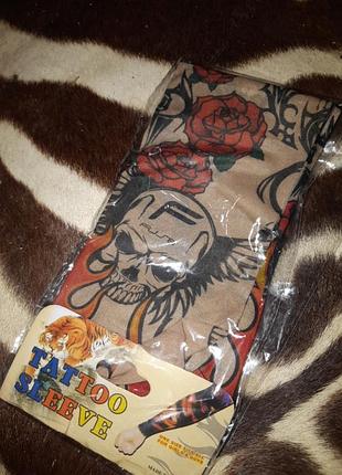 Пара тату рукавів з черепами вогнем і розами