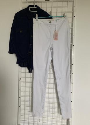 Нові штани skinny premium denim р.12/ m-l1 фото