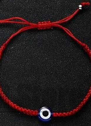 Червоний браслет на руку з намистиною "турецьке око" , оберіг4 фото