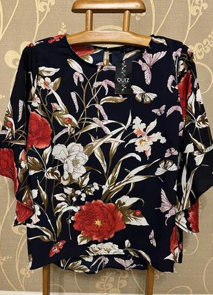 Очень красивая и стильная брендовая блузка.1 фото