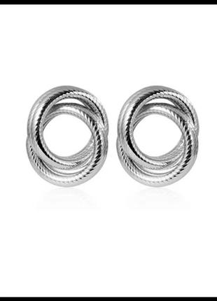 Стильні сережки переплетені кільця