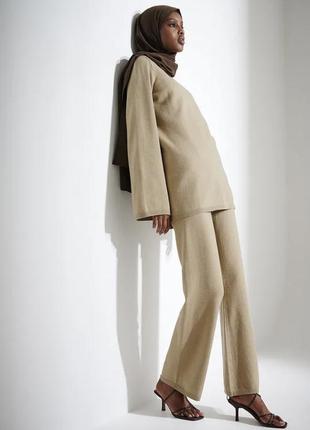 Бежеві трикотажні штани na-kd