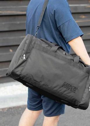 Мужская вместительная дорожная спортивная сумка найк nike fat черная тканевая для тренировок на 60 л