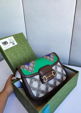 Шикарна коричнева  брендова  сумка клатч через плече10 фото