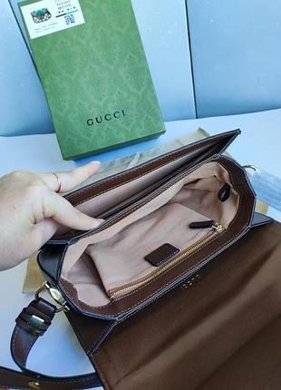 Шикарна коричнева  брендова  сумка клатч через плече7 фото