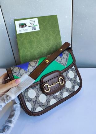 Шикарна коричнева  брендова  сумка клатч через плече