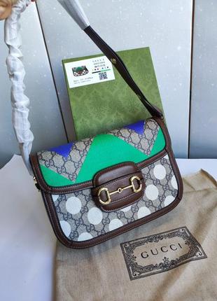 Шикарна коричнева  брендова  сумка клатч через плече6 фото