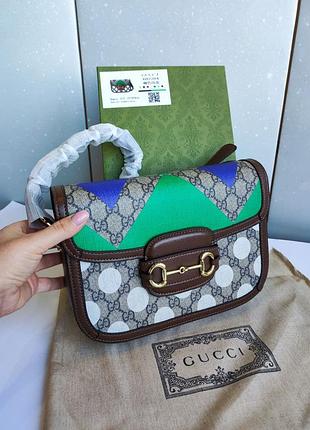 Шикарна коричнева  брендова  сумка клатч через плече2 фото