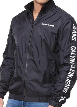 Ветровка курточка с лампасами calvin klein side logo truck jacket1 фото