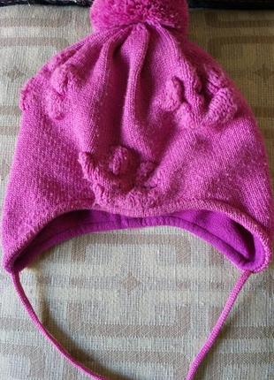 Теплая фирменная шапочка для малышки lenne1 фото