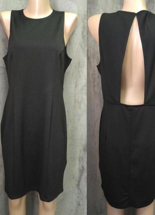 Черное прямое трикотажное платье по фигуре размер l2 фото