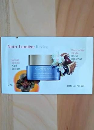 Clarins живильний антивіковий денний крем, що коригує жовтуватий тон шкіри nutri-lumiere revive