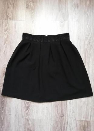 Красивая чёрная коротенькая юбка1 фото