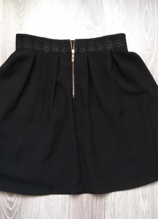 Красивая чёрная коротенькая юбка2 фото